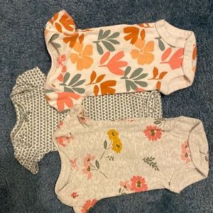 Carters size preemie. Three pack short sleeve button onesies.